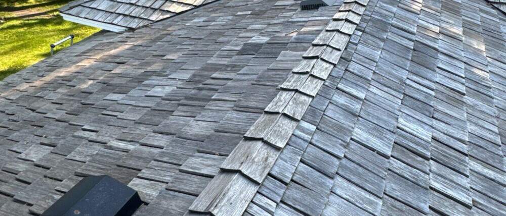 Weathered wood shake shingles on a roof