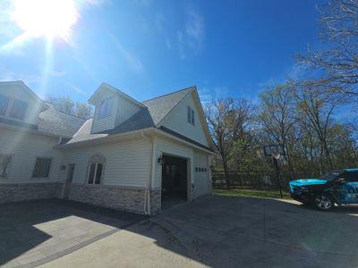 Elegant Siding and Stone Upgrade