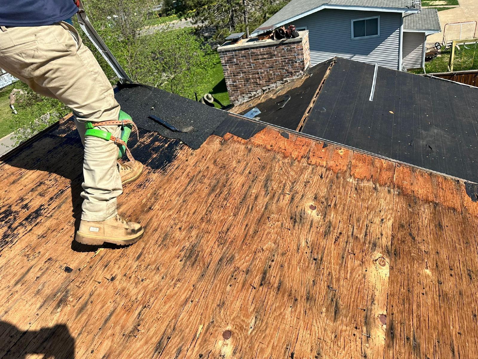 omega exteriors replacing a roof