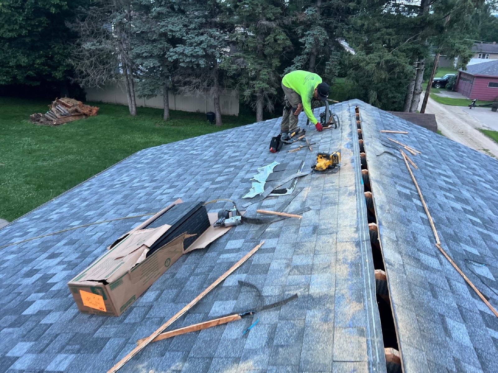 omega exteriors working on a roof replacement