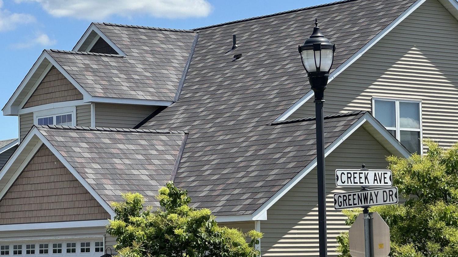Siding Installation — Omega Exteriors