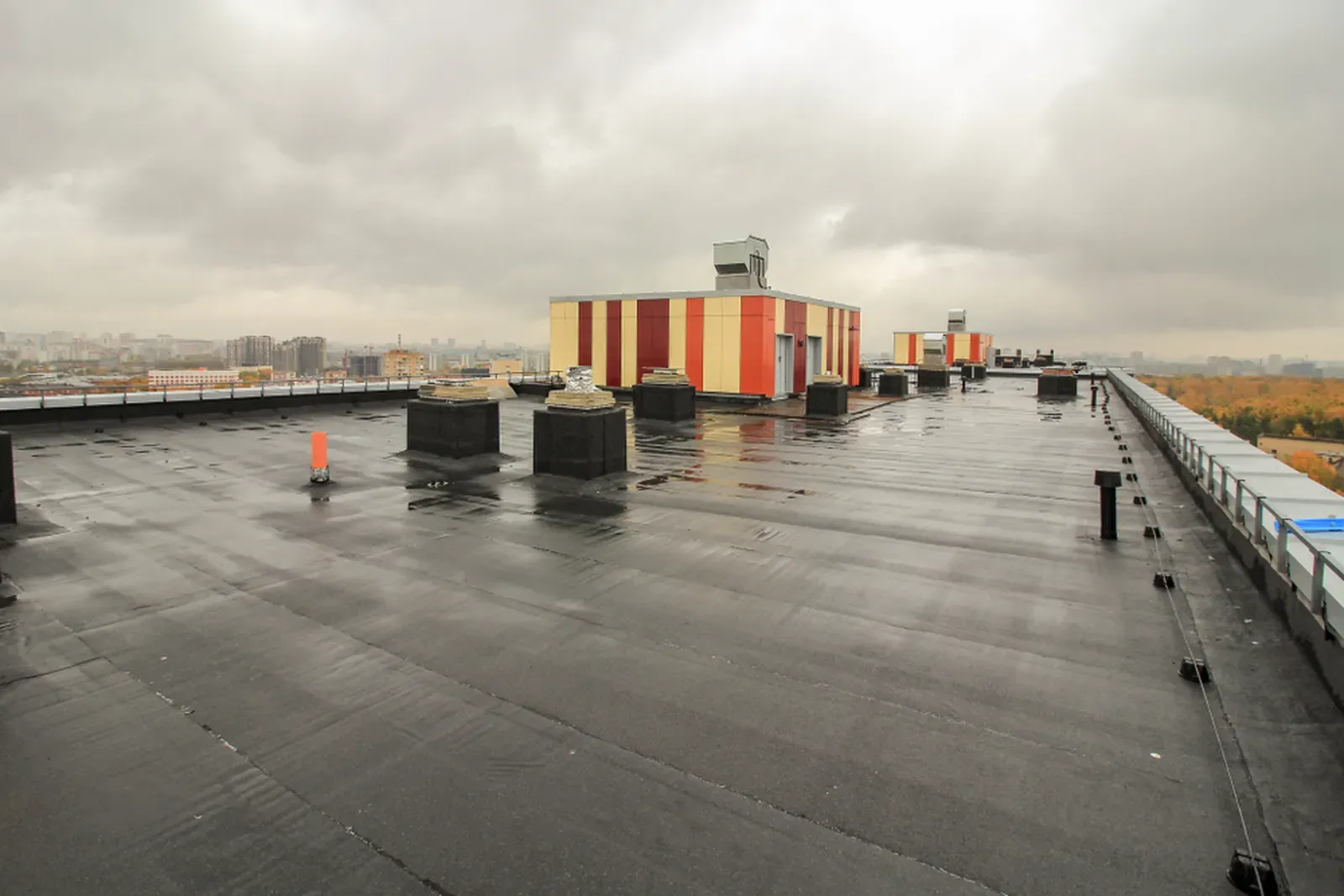 Installation of EPDM roofing for commercial property with a focus on replacing and coating. | Omega Exteriors