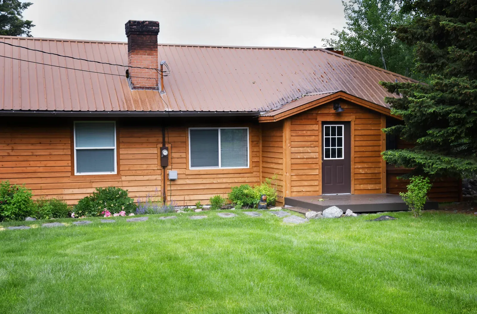 Cedar siding material stacked neatly for construction purposes. | Omega Exteriors